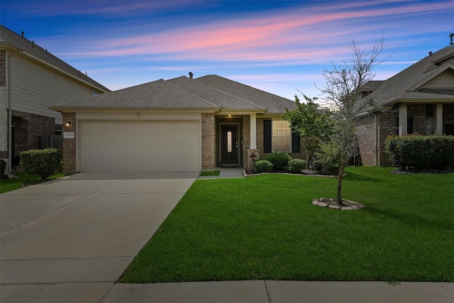 12915 Taper Reach Dr, Tomball, TX 77377 - ranch-style home with a garage, brick siding, concrete driveway, a front yard, and a shingled roof