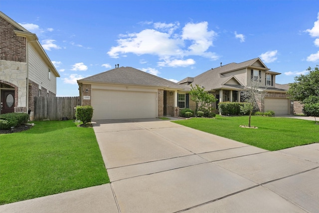 12915 Taper Reach Dr, Tomball, TX 77377 - view of front of house featuring brick siding, concrete driveway, and an attached garage