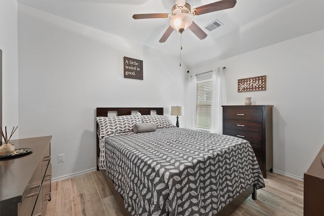 12915 Taper Reach Dr, Tomball, TX 77377 - bedroom featuring light wood finished floors and ceiling fan