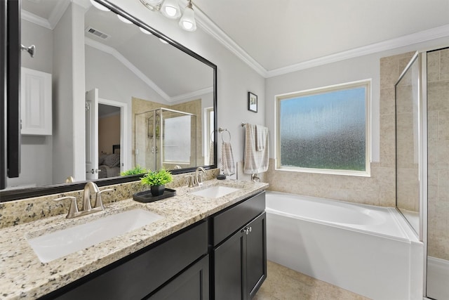 12915 Taper Reach Dr, Tomball, TX 77377 - ensuite bathroom with a shower stall, a bath, double vanity, tile patterned flooring, and ornamental molding