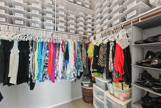 12915 Taper Reach Dr, Tomball, TX 77377 - spacious closet featuring wood finished floors