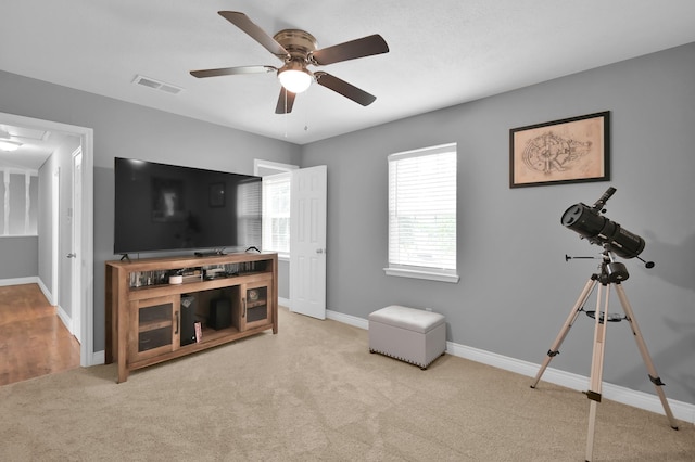 833 Stone Mountain Dr, Conroe, TX 77302 - sitting room featuring carpet, ceiling fan, and baseboards