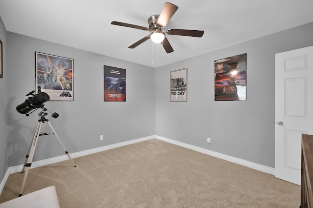 833 Stone Mountain Dr, Conroe, TX 77302 - unfurnished room with light carpet, a ceiling fan, and baseboards