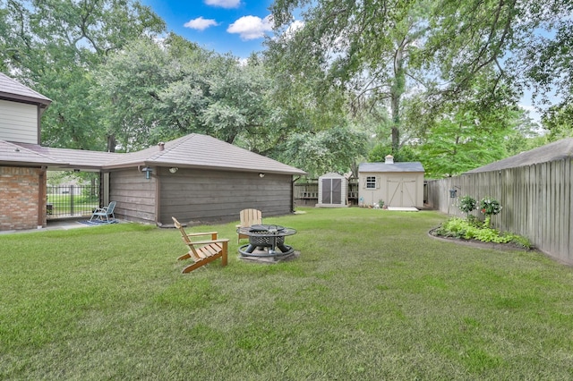 833 Stone Mountain Dr, Conroe, TX 77302 - view of yard featuring a fire pit