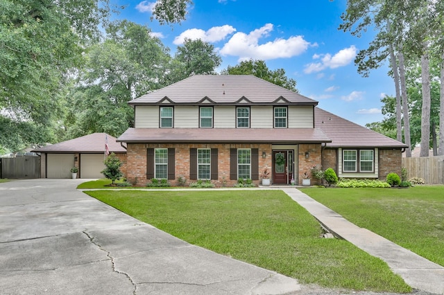 833 Stone Mountain Dr, Conroe, TX 77302 - view of front of house with a garage, brick siding, and concrete driveway