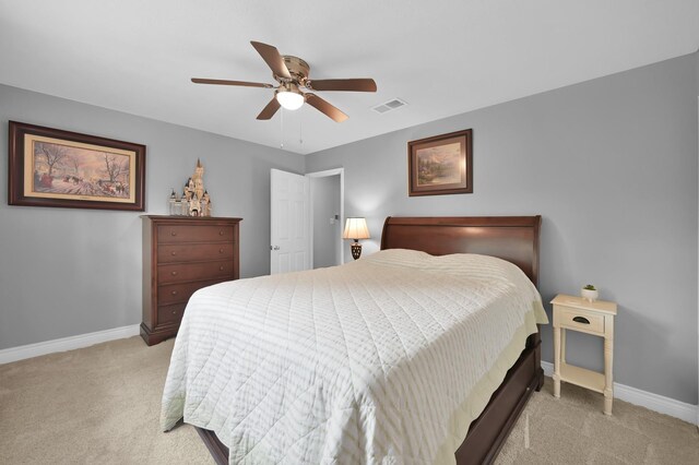 833 Stone Mountain Dr, Conroe, TX 77302 - bedroom featuring light colored carpet, baseboards, and a ceiling fan