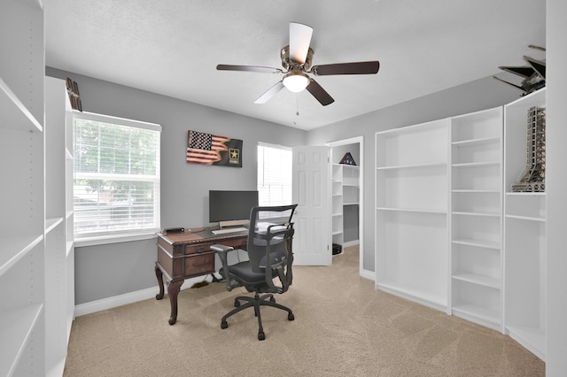 833 Stone Mountain Dr, Conroe, TX 77302 - carpeted office featuring a ceiling fan and baseboards