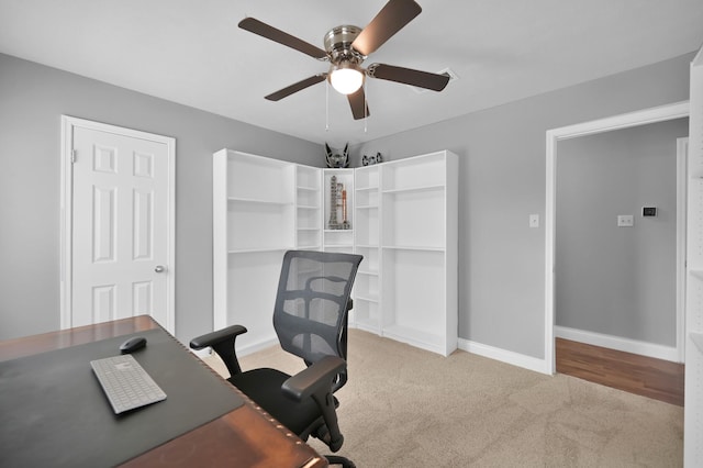 833 Stone Mountain Dr, Conroe, TX 77302 - office area with carpet floors, a ceiling fan, and baseboards