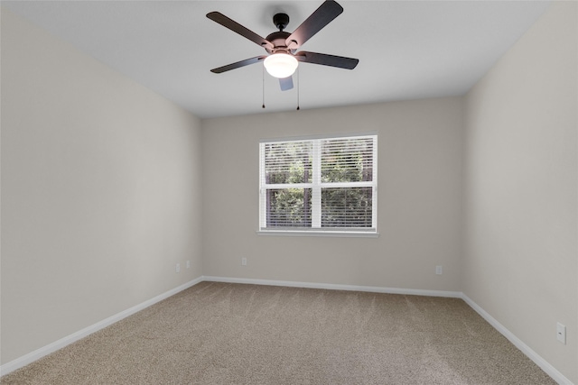 7571 Fettle Ln, Conroe, TX 77304 - unfurnished room featuring carpet floors, ceiling fan, and baseboards