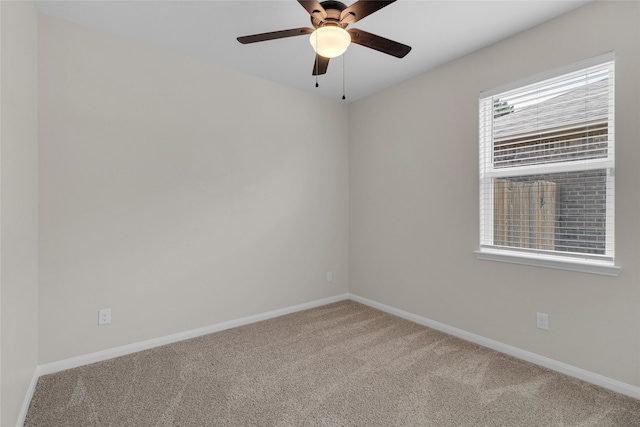 7571 Fettle Ln, Conroe, TX 77304 - carpeted spare room featuring a ceiling fan and baseboards