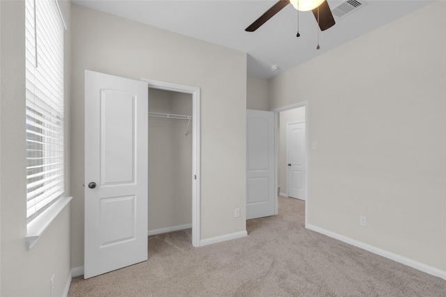 7571 Fettle Ln, Conroe, TX 77304 - unfurnished bedroom featuring carpet, baseboards, and a closet