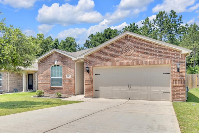 7571 Fettle Ln, Conroe, TX 77304 - ranch-style house featuring brick siding, driveway, a garage, and a front lawn