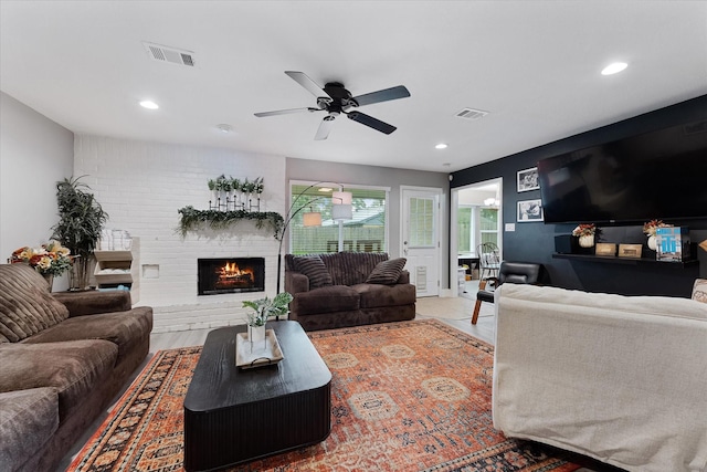 30307 Thorsby Dr, Spring, TX 77386 - living room with a ceiling fan, a fireplace, and recessed lighting