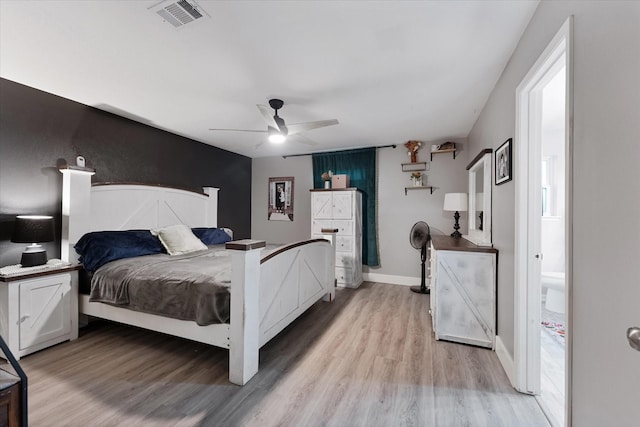 30307 Thorsby Dr, Spring, TX 77386 - bedroom featuring light wood-style flooring, ceiling fan, and baseboards