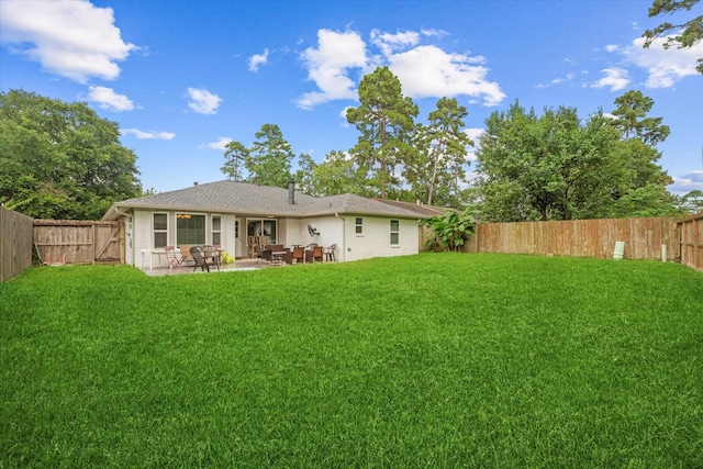 30307 Thorsby Dr, Spring, TX 77386 - back of property featuring a patio and brick siding