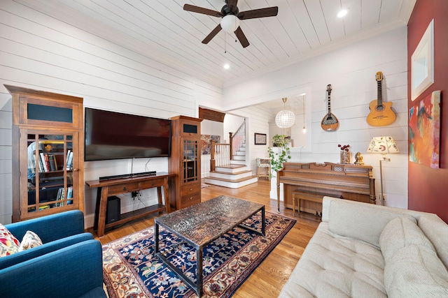 2019 Crockett St, Houston, TX 77007 - living area featuring ceiling fan, stairway, crown molding, light wood-style floors, and wooden ceiling