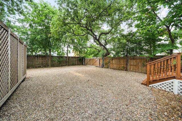 2019 Crockett St, Houston, TX 77007 - fenced backyard with a wooden deck