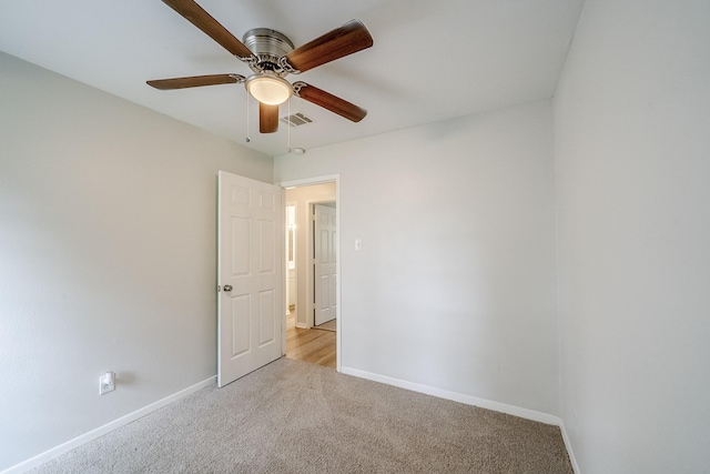 11063 Vailview Dr, Houston, TX 77016 - spare room with light carpet, baseboards, and a ceiling fan