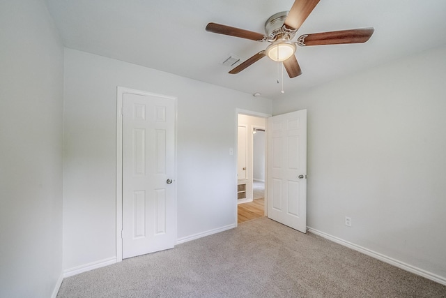 11063 Vailview Dr, Houston, TX 77016 - unfurnished bedroom with carpet, baseboards, and ceiling fan