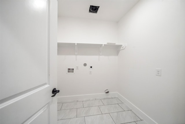708 Azalea St, Prairie View, TX 77484 - washroom featuring electric dryer hookup, baseboards, hookup for a washing machine, and hookup for a gas dryer
