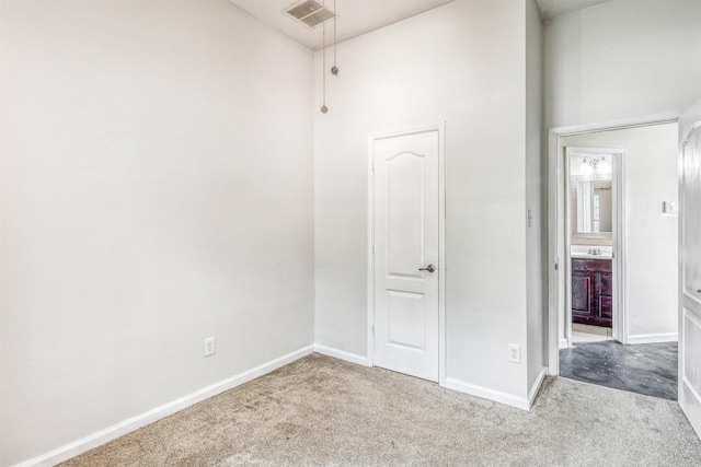 7523 Chathan Glen Ln, Richmond, TX 77407 - unfurnished bedroom with carpet floors, baseboards, and connected bathroom