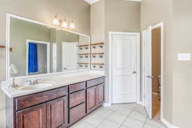 7523 Chathan Glen Ln, Richmond, TX 77407 - full bathroom featuring tile patterned flooring, vanity, toilet, and baseboards