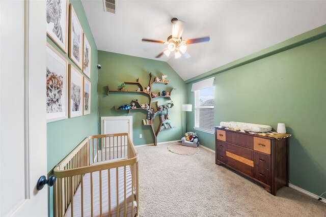 1406 Kallie Hills Ln, Spring, TX 77386 - bedroom featuring carpet floors, vaulted ceiling, a crib, baseboards, and a ceiling fan
