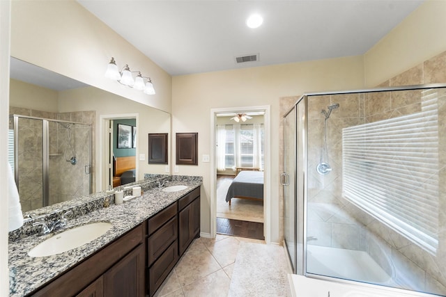 1406 Kallie Hills Ln, Spring, TX 77386 - full bath with connected bathroom, tile patterned flooring, double vanity, and a stall shower
