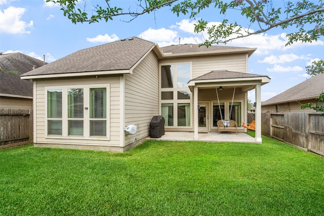 1406 Kallie Hills Ln, Spring, TX 77386 - rear view of property featuring a patio area, ceiling fan, and roof with shingles
