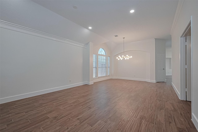 4046 Dell Ln, Missouri City, TX 77459 - unfurnished room with a chandelier, lofted ceiling, dark wood-style floors, crown molding, and recessed lighting