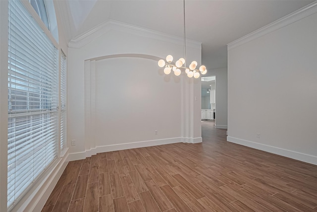 4046 Dell Ln, Missouri City, TX 77459 - spare room featuring wood finished floors, a chandelier, and ornamental molding