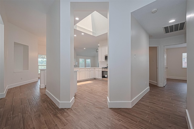 4046 Dell Ln, Missouri City, TX 77459 - hall featuring wood finished floors and recessed lighting