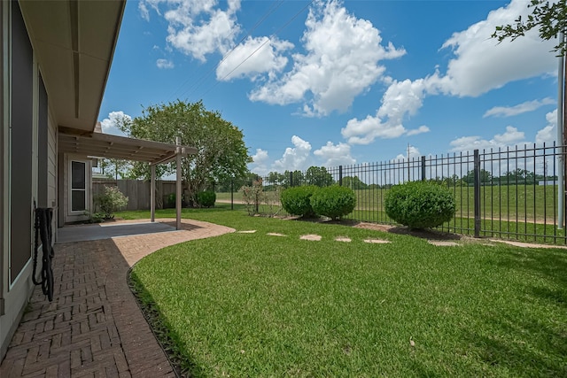 4046 Dell Ln, Missouri City, TX 77459 - fenced backyard with a patio area