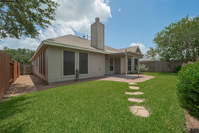 4046 Dell Ln, Missouri City, TX 77459 - rear view of house with a patio, a fenced backyard, a chimney, and a shingled roof