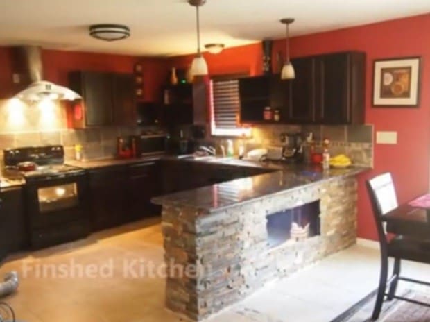 23407 Little Wind Ln, Spring, TX 77373 - kitchen featuring black range with electric cooktop, ventilation hood, decorative backsplash, pendant lighting, and a peninsula
