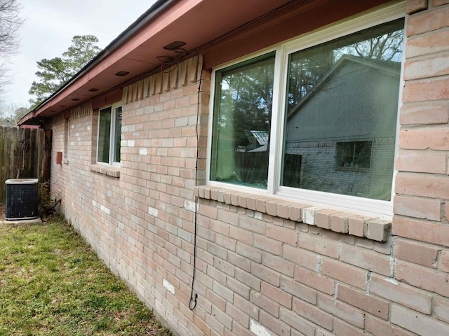 23407 Little Wind Ln, Spring, TX 77373 - view of side of property featuring brick siding and a central air condition unit