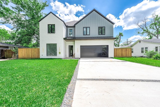 207 W 33rd St, Houston, TX 77018 - modern farmhouse style home with board and batten siding, concrete driveway, and an attached garage