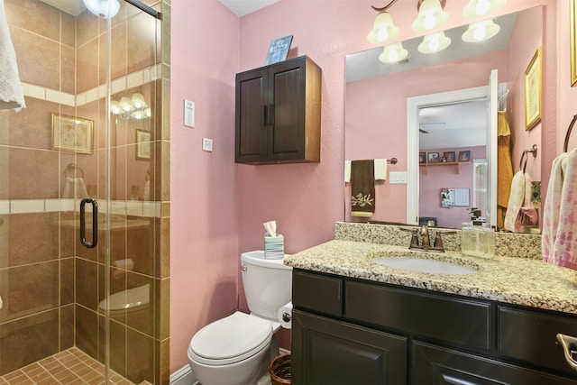 18 Brookefield Cir, Magnolia, TX 77355 - bathroom with toilet, vanity, and a shower stall