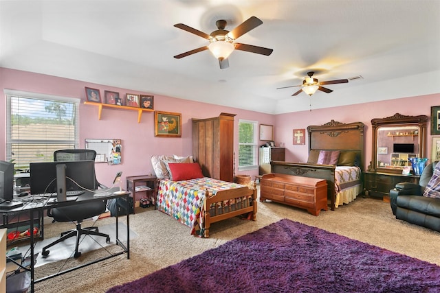 18 Brookefield Cir, Magnolia, TX 77355 - bedroom with multiple windows, carpet floors, a desk, and ceiling fan