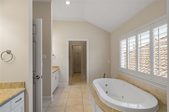 5507 Val Verde St, Houston, TX 77056 - full bathroom featuring vanity, healthy amount of natural light, a whirlpool tub, lofted ceiling, and tile patterned flooring
