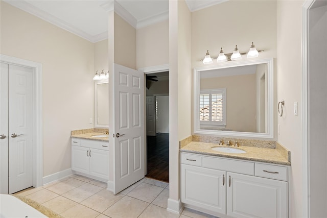 5507 Val Verde St, Houston, TX 77056 - bathroom featuring two vanities, ornamental molding, and tile patterned floors