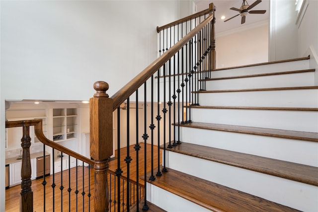 5507 Val Verde St, Houston, TX 77056 - stairway featuring ornamental molding, wood finished floors, a ceiling fan, and recessed lighting