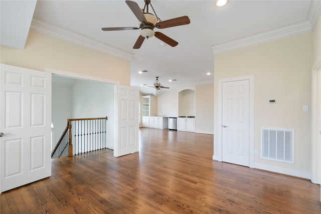 5507 Val Verde St, Houston, TX 77056 - spare room with a ceiling fan, crown molding, wood finished floors, arched walkways, and recessed lighting