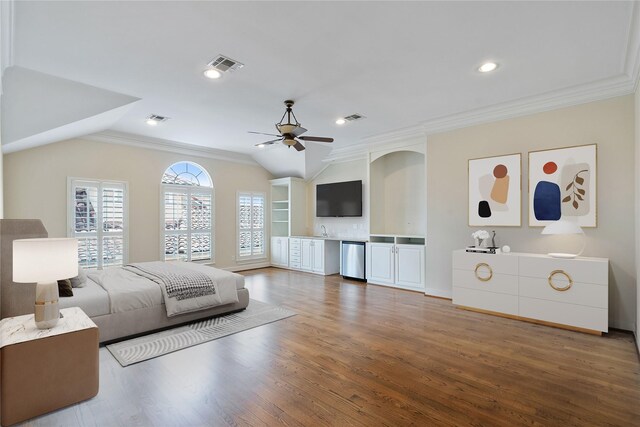 5507 Val Verde St, Houston, TX 77056 - bedroom with ornamental molding, wood finished floors, lofted ceiling, ceiling fan, and fridge