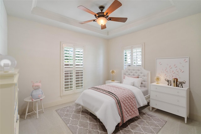 5507 Val Verde St, Houston, TX 77056 - bedroom featuring a raised ceiling, multiple windows, carpet, and ceiling fan