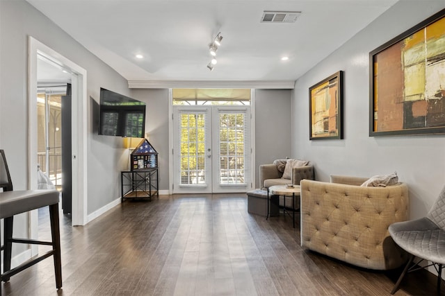 3300 Yorktown St Unit 24, Houston, TX 77056 - sitting room with french doors, wood finished floors, baseboards, and rail lighting
