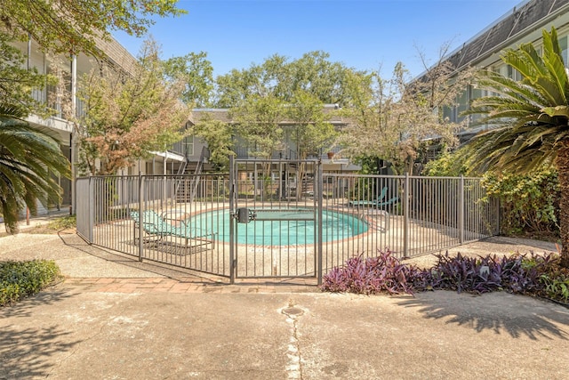 3300 Yorktown St Unit 24, Houston, TX 77056 - view of swimming pool featuring a patio area