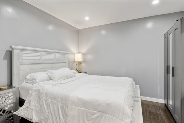 3300 Yorktown St Unit 24, Houston, TX 77056 - bedroom with dark wood-style floors, baseboards, and recessed lighting