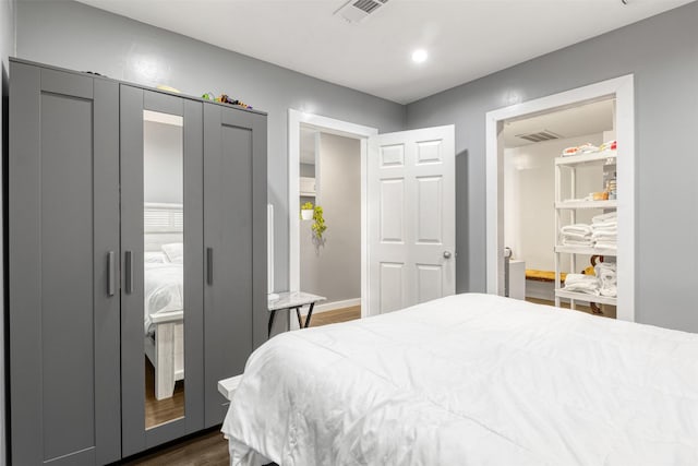 3300 Yorktown St Unit 24, Houston, TX 77056 - bedroom with dark wood finished floors and recessed lighting