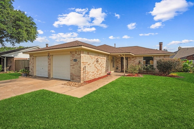 11731 Bexar Dr, La Porte, TX 77571 - single story home featuring a garage, driveway, a front lawn, and brick siding
